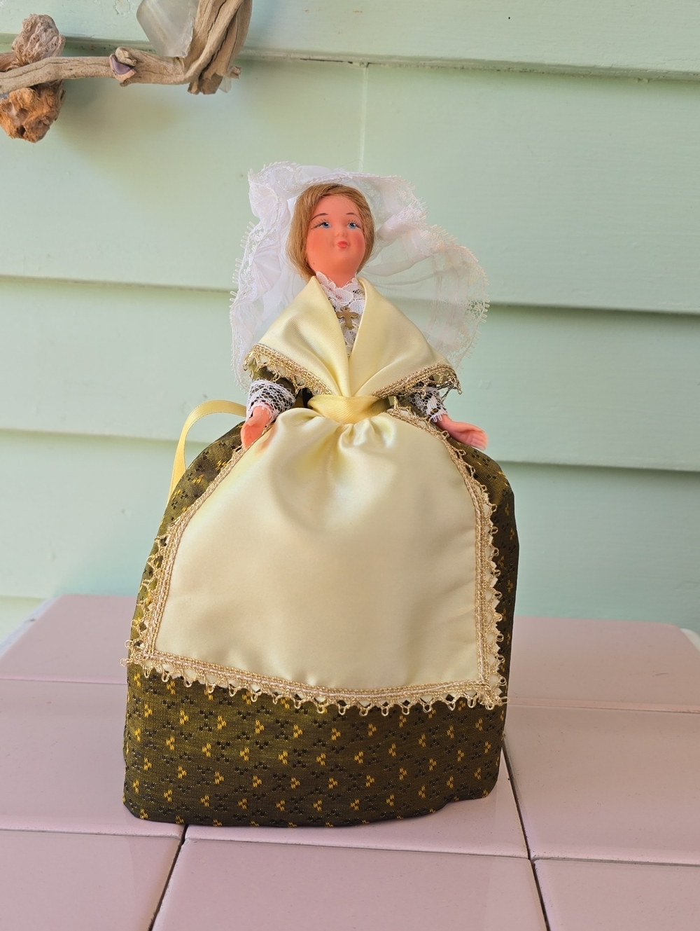 Vintage collectible doll from Normandy region, France, featuring traditional cos